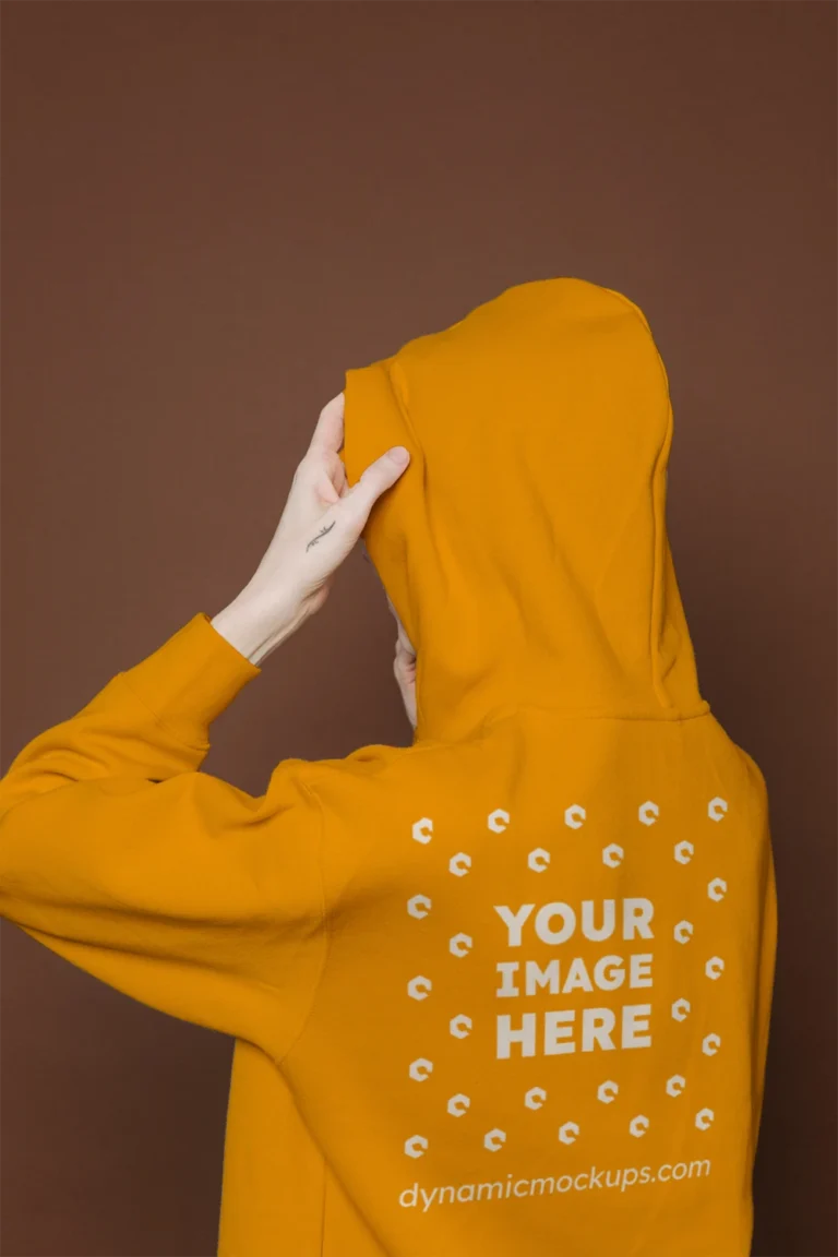 Woman Wearing Orange Hoodie Mockup Back View Template
