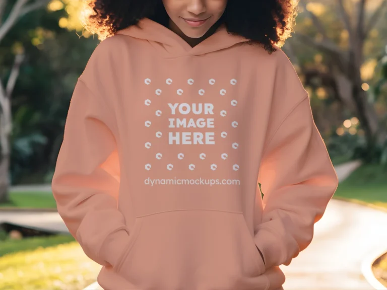 Woman Wearing Peach Hoodie Mockup Front View Template