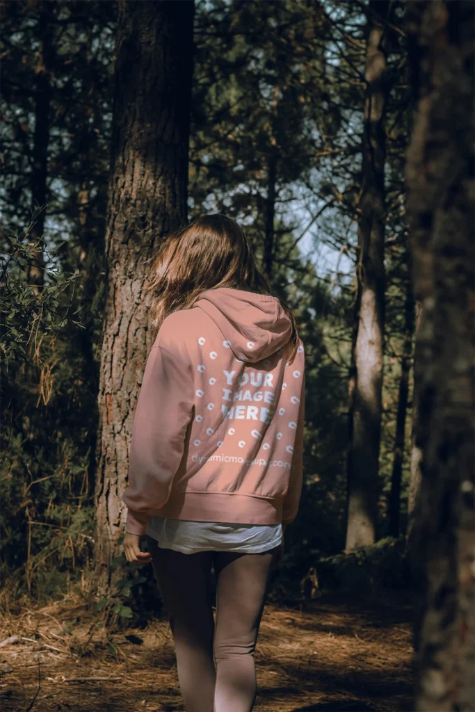 Woman Wearing Peach Hoodie Mockup Back View Template