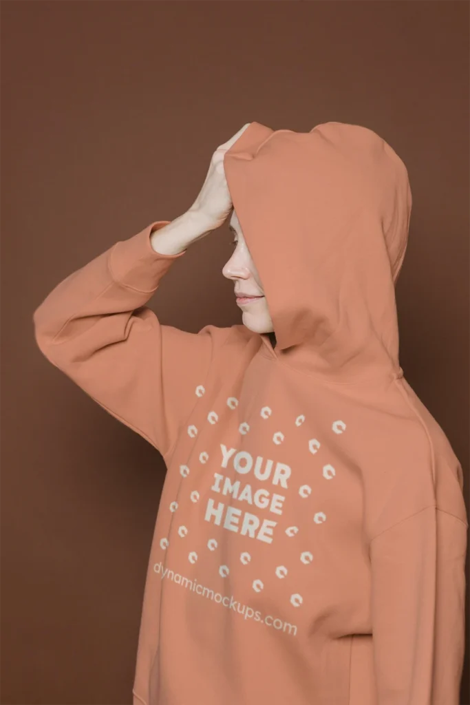 Woman Wearing Peach Hoodie Mockup Front View Template