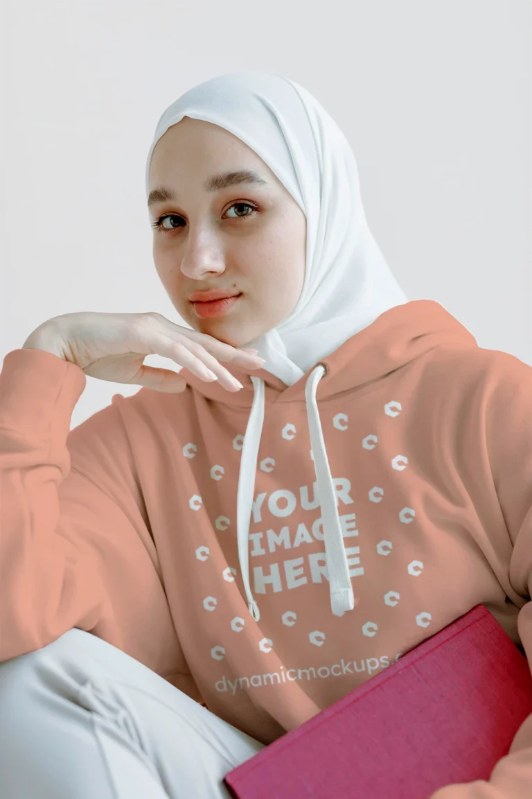 Woman Wearing Peach Hoodie Mockup Front View Template