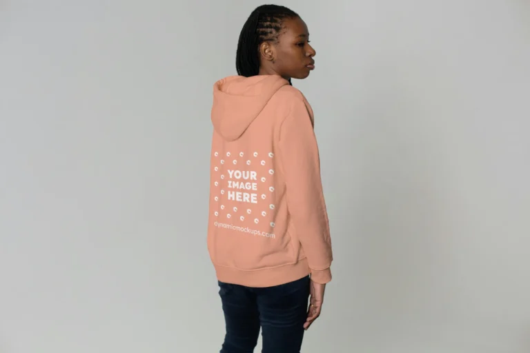 Woman Wearing Peach Hoodie Mockup Back View Template
