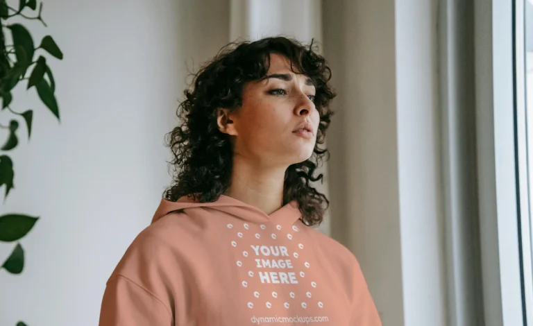 Woman Wearing Peach Hoodie Mockup Front View Template
