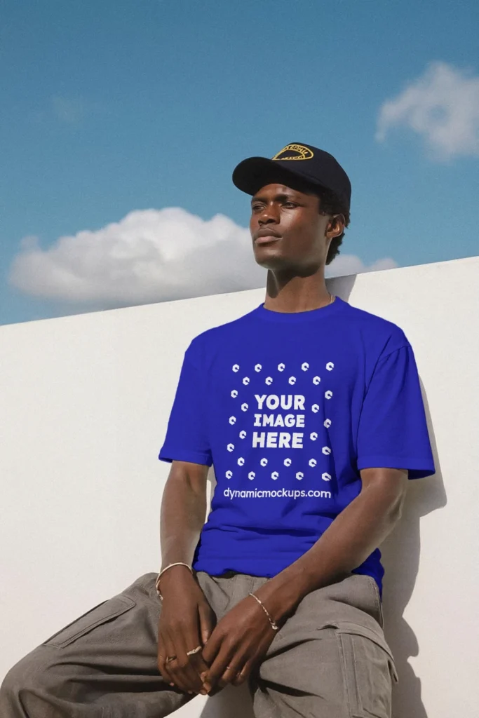 Man Wearing Blue T-shirt Mockup Front View Template
