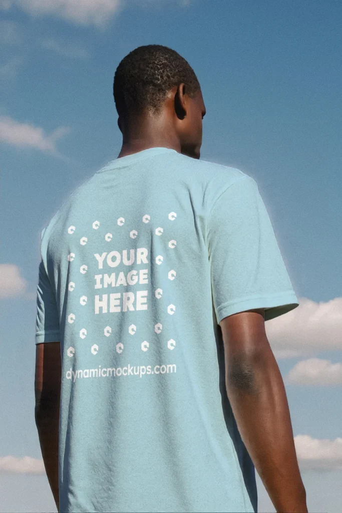 Man Wearing Light Blue T-shirt Mockup Back View Template