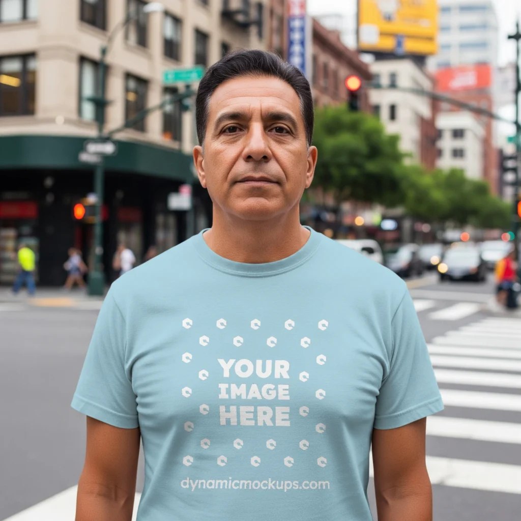 Man Wearing Light Blue T-shirt Mockup Front View Template