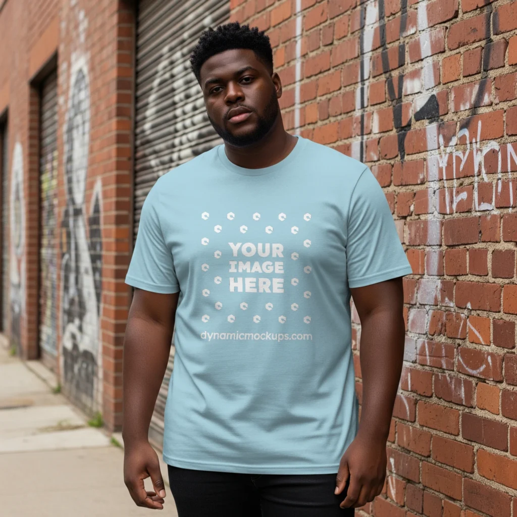 Man Wearing Light Blue T-shirt Mockup Front View Template