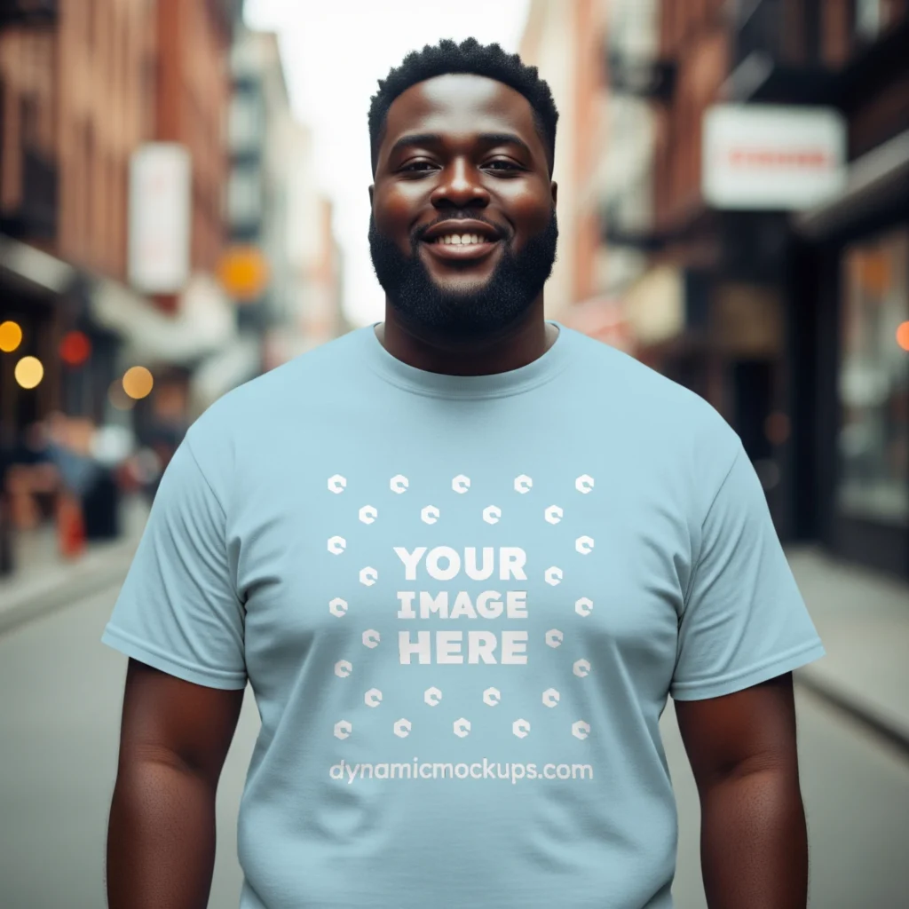 Man Wearing Light Blue T-shirt Mockup Front View Template