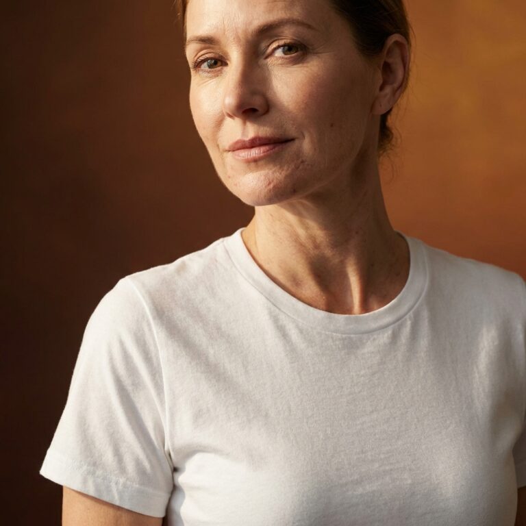 Adult White Woman Wearing Gildan Softstyle® Women’s CVC T-Shirt – 64001LCVC Mockup Template