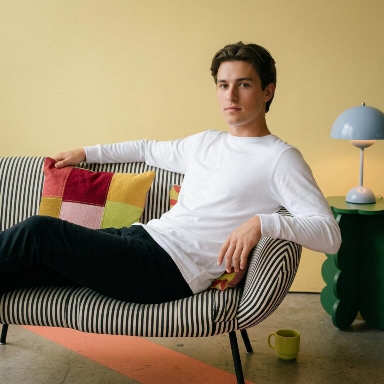 Free Long-Sleeve T-Shirt Mockup in a Retro-Modern Interior