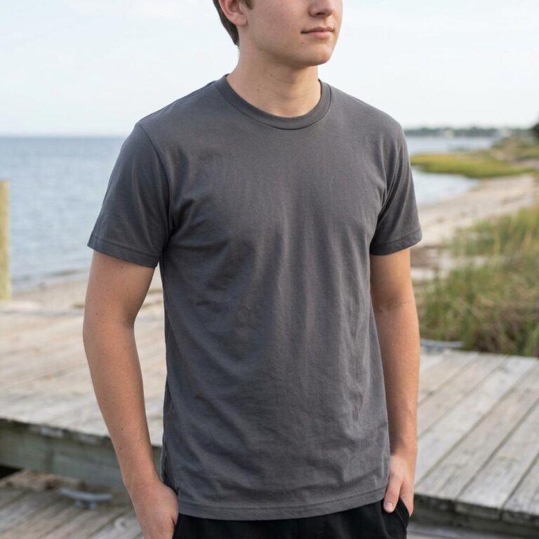 Candid Beach T-Shirt Mockup in a Coastal Dock Setting